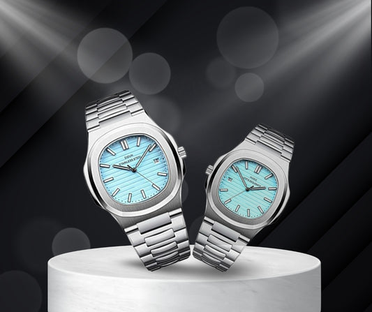 DIDUN Stainless Steel Men Watches featuring aqua blue dials and silver bracelets displayed on a pedestal.